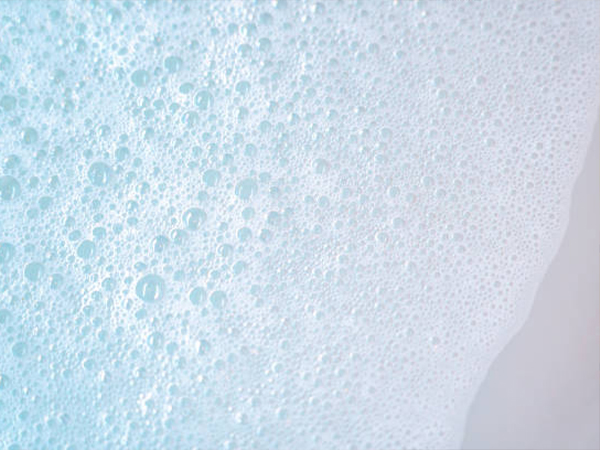 Silicone and polyether defoamers