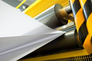 Rolls of white industrial paper.